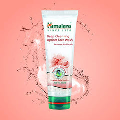 Himalaya deep cleansing apricot face wash tube with splash droplets, white and green base
