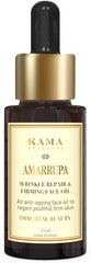 Kama Ayurveda face oil bottle with gold cap and amber glass