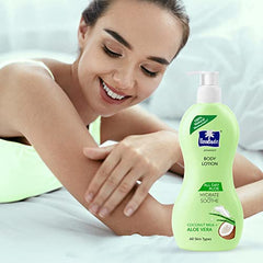 Woman applying Parachute Advansed body lotion on arms, bottle with pump in view