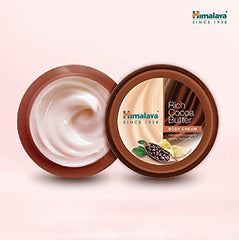 Himalaya Rich Cocoa Butter body cream jar open, showing white cream inside