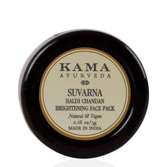 Kama Ayurveda face pack jar lid with Suvarna Haldi Chandan label, dark round top.