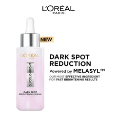 Dark spot serum bottle with white dropper and label reading Dark Spot Reduction