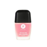 Matte nail lacquer bottle in pink flamingo shade with black cap