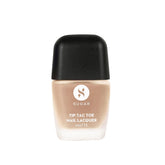 Matte nail lacquer bottle with black cap, beige nude tone