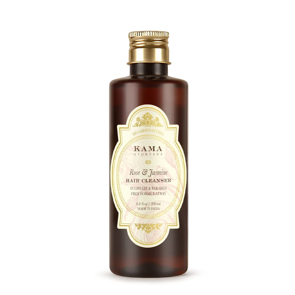 Hair cleanser bottle with Rose & Jasmine label, dark amber glass and gold cap.