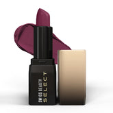 Matte lipstick in sleek black tube, cap off; rich wine plum shade