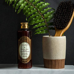Kama Ayurveda Himalayan Deodar Hair Conditioner bottle, amber glass with gold cap