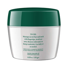 Green-and-white face scrub jar back with use instructions
