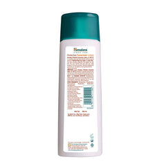 Himalaya sunscreen lotion bottle with teal cap, back label with directions
