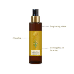 Forest Essentials body mist bottle with gold sprayer, amber glass and yellow label