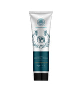 Forest Essentials shaving cream tube, white with teal band and elephant logo