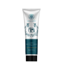 Forest Essentials shaving cream tube, white with teal band and elephant logo