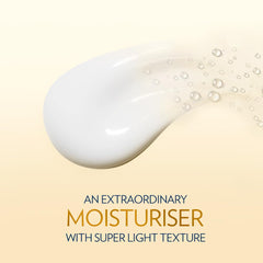 Super light moisturizing lotion blob with water-like droplets on skin