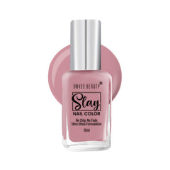 Lavender-toned nail polish bottle with silver cap and square glass base