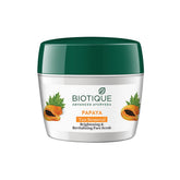 Green-and-white face scrub jar with papaya label and BIOTIQUE branding