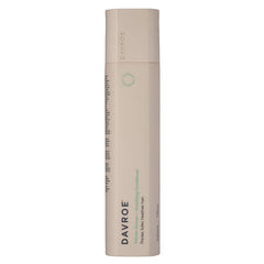 Shampoo & conditioner bottle, beige cylinder with green accent text and Davroe branding