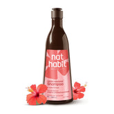 Fresh Navdha shampoo bottle, dark brown with pink label and hibiscus accents