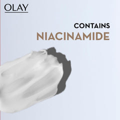 Foaming cleanser foam on fingertips, with Olay and Niacinamide text