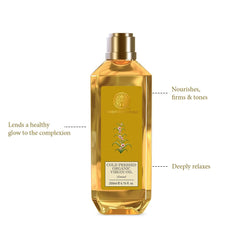 Forest Essentials almond oil bottle, gold cap, amber bottle, front view