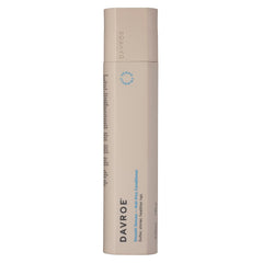 Davroe anti-frizz shampoo and conditioner bottle, beige with vertical blue label text