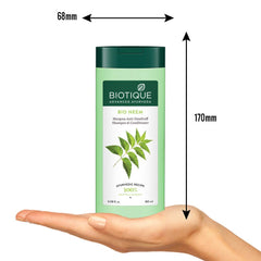 Bio Neem anti-dandruff shampoo and conditioner bottle held in hand, with size markers