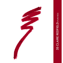 Deep red lip crayon swatch smear, showing bold matte color payoff.