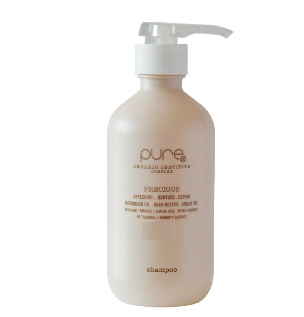 Organic shampoo bottle with white pump, clear label reading Precious and pure