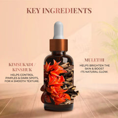 Facial oil bottle with illustrated orange flowers on the label.
