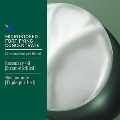 Hair conditioner concentrate swatch on a glossy sphere with micro-dosed label