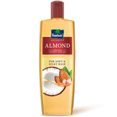 Parachute Advanced Almond coconut hair oil bottle, amber with red cap, 300 ml