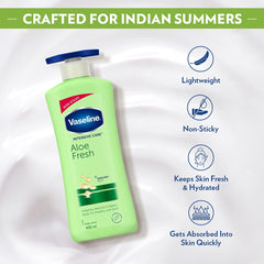 Vaseline Aloe Fresh body lotion bottle with blue pump cap on front view.