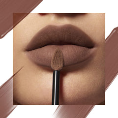 Matte nude-brown lipstick on lips with gold-tipped applicator