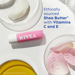 NIVEA Soft Rosé lip balm stick with creamy rose-tinted swatches.