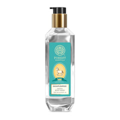 Baby hair and body wash bottle, transparent with gold pump and teal label, 200 ml