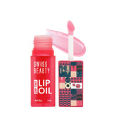 Lip oil set with red-pink bottle, clear cap, and pink applicator wand with glossy oil