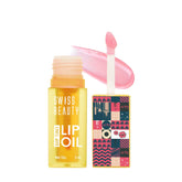 Lip oil tint in amber bottle with clear cap and pink applicator tip