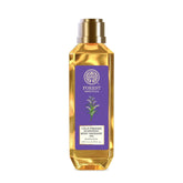 Forest Essentials body massage oil bottle, gold cap and purple label