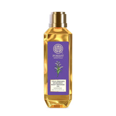 Forest Essentials body massage oil bottle, gold cap and purple label