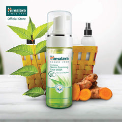Neem foaming face wash bottle with white pump and green label, with neem leaves