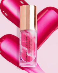 Berry pink lip gloss bottle with rose-gold cap