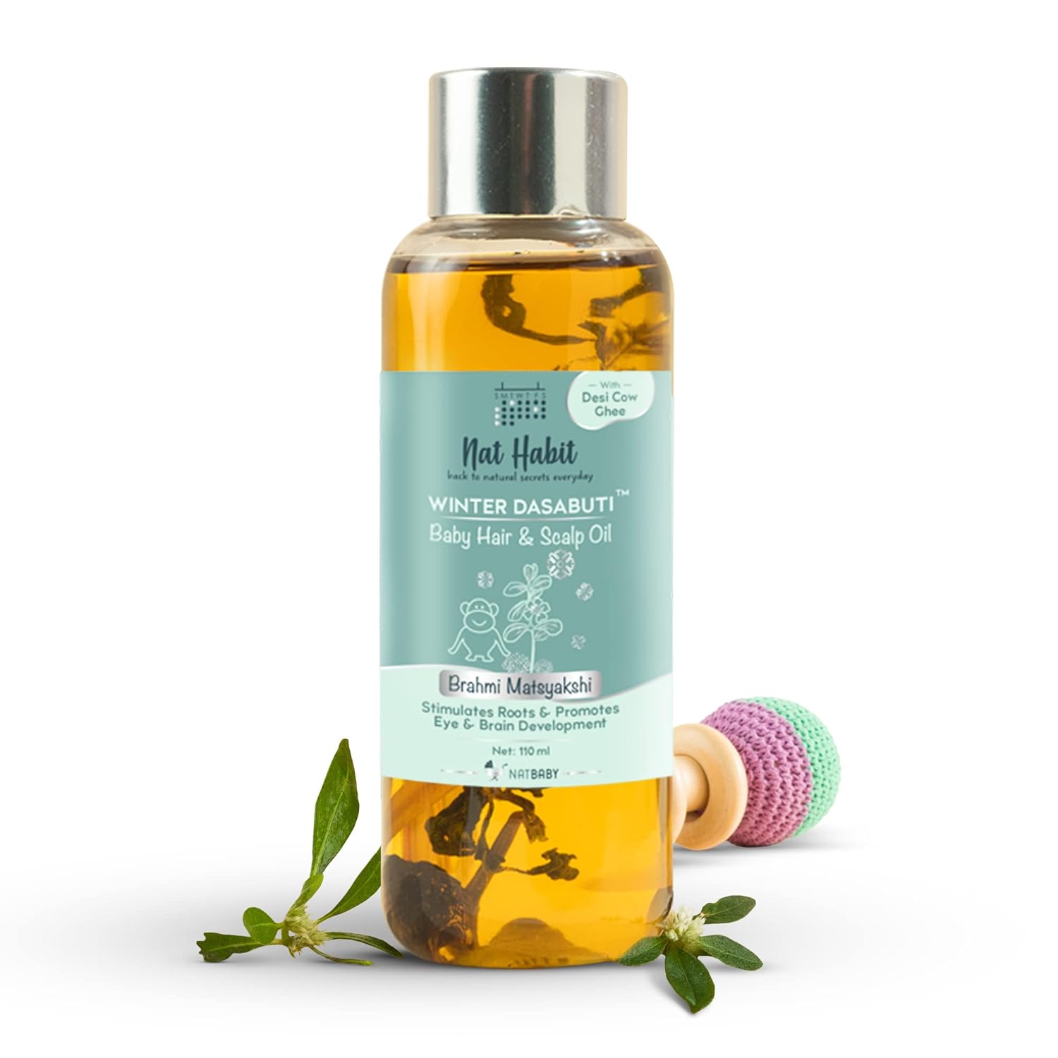 Baby hair and scalp oil bottle with amber liquid and metal cap