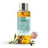 Baby hair and scalp oil bottle with amber liquid and metal cap