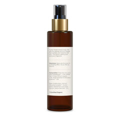 Forest Essentials body mist bottle, back label view with gold spray pump