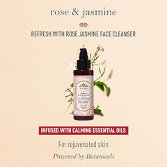 Rose jasmine face cleanser bottle with black pump beside green stems and leaves