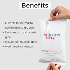 Hand holding white O3+ Bridal Facial Kit pouch with red O3+ logo