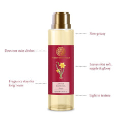 After bath oil bottle with gold pump and red label, feature callouts