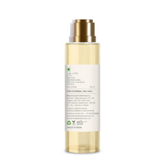 After bath oil bottle with gold pump and back details label, made in India
