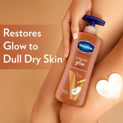 Vaseline Cocoa Glow body lotion bottle with blue pump near heart-shaped lotion mark