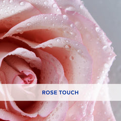 Soft Rosé lip balm rose-touch texture on glossy pink cream swirls.
