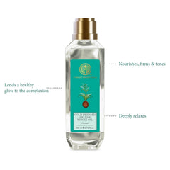 Cold pressed organic virgin coconut oil bottle with gold cap and teal label